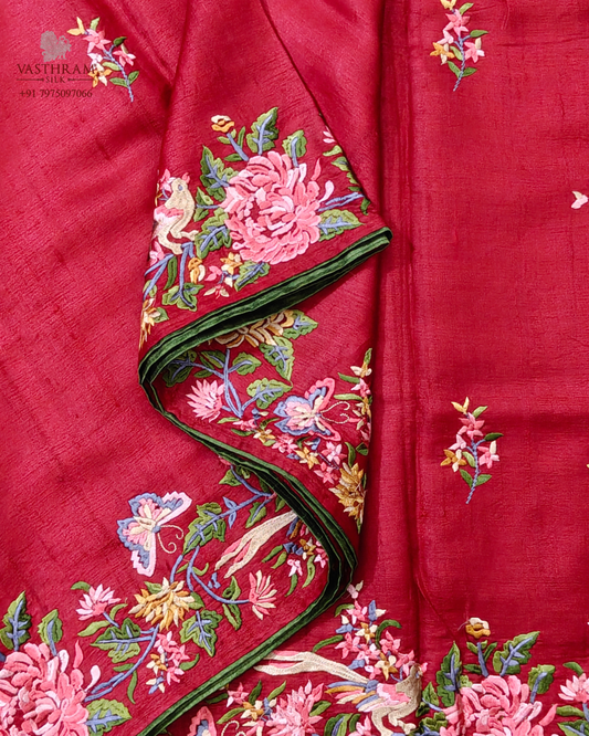 Red colour tussare silk saree with parsigara embroidery butta all over