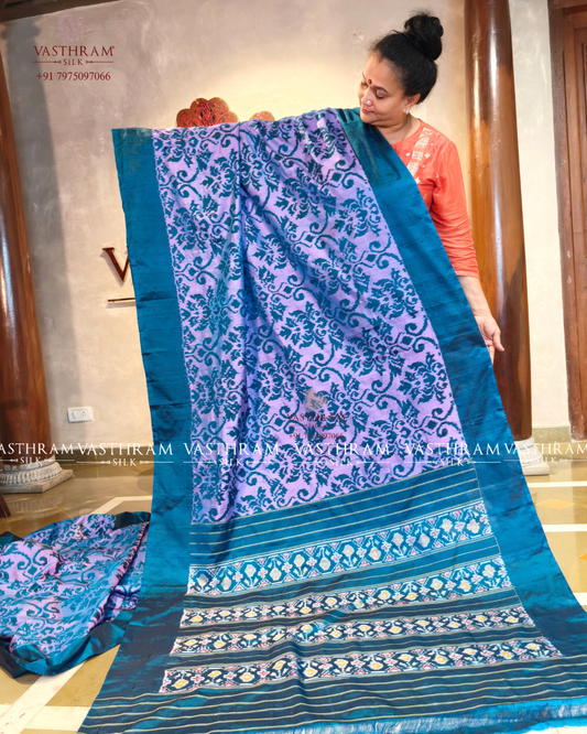 Lavender colour ikkat silk saree with ikkat weaving all over