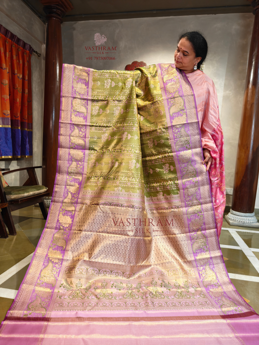 Olive Green Colour Tissue Kanchivaram Silk Saree With Zari Motifs All Over