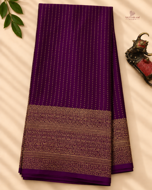 Magenta colour crush mysore crepe silk saree with small zari butta all over
