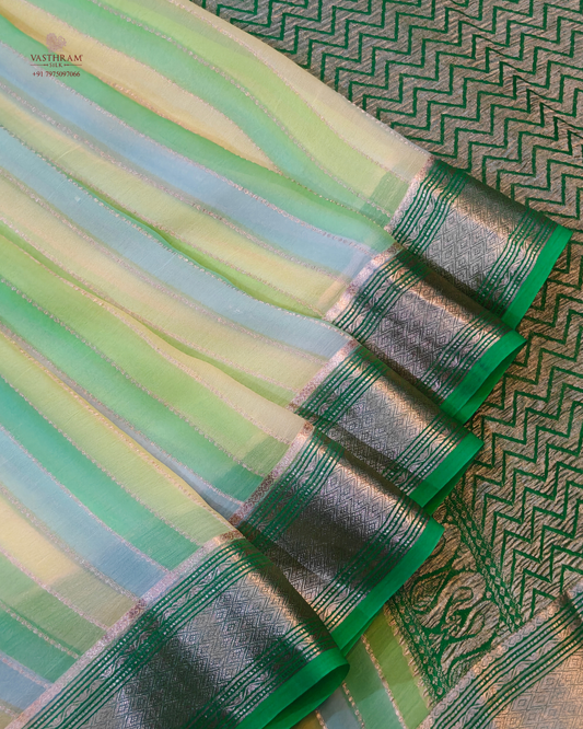 Light Green colour georgette saree with zari stripes all over