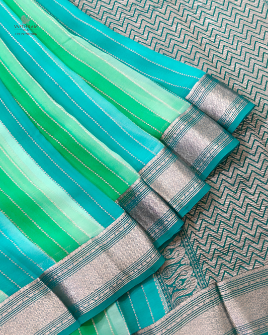 Sky Blue colour georgette saree with zari stripes all over