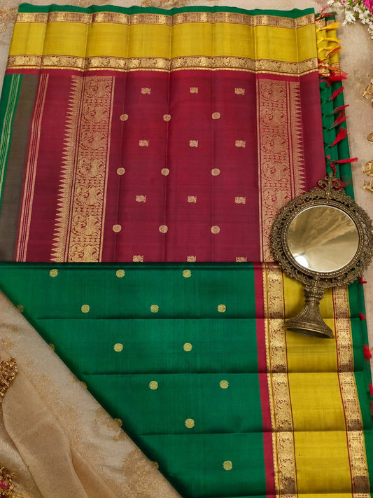 Green colour pure zari kanchivaram silk saree with rudraksham zari butt all over