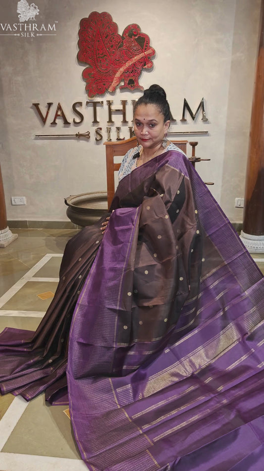 Brown colour pure zari kanchivaram silk saree with rudhraksham zari butta all over